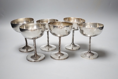 A set of six early 20th century Chinese Export white metal goblets, by Luen Wo, Shanghai, with faux bamboo stems, height 11.9cm, 29oz, (heights differ).